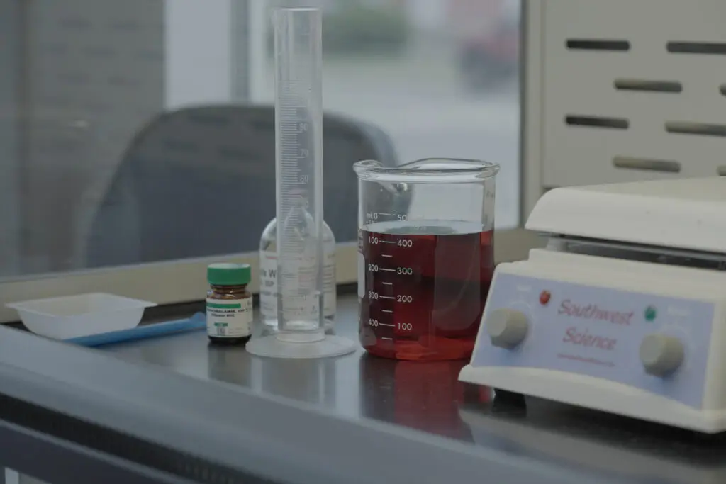 Westmoreland pharmacy image with beakers and scale