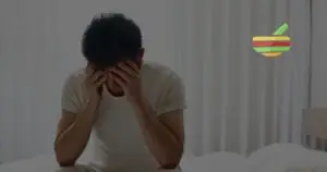 Photo of Man sitting on his bed eith erectile dysfunction